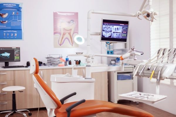 showing the dental chair and x-rays of teeth